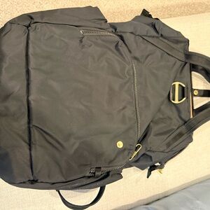 Pacsafe Black Backpack with Gold Details